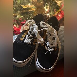 Vans Kids Black Sneakers with Gold Accents
